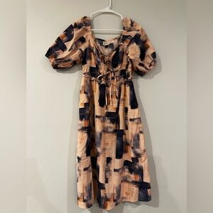 Women’s midi, pink peach and navy geometric design dress w/puff sleeves in small